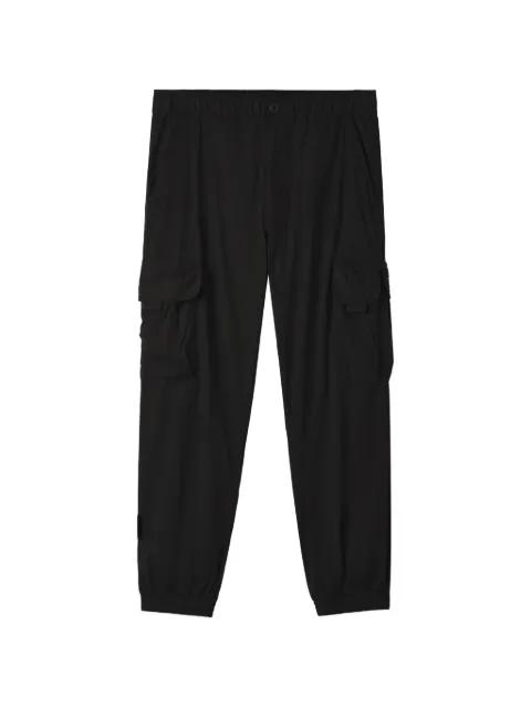 cargo-pocket trousers by IZZUE