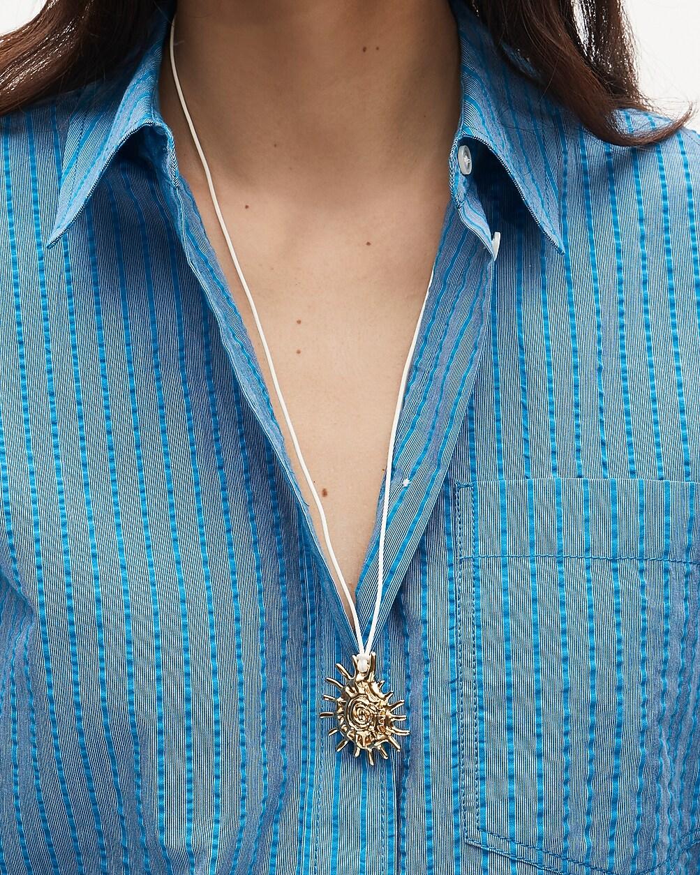 Metallic sun pendant necklace by J.CREW