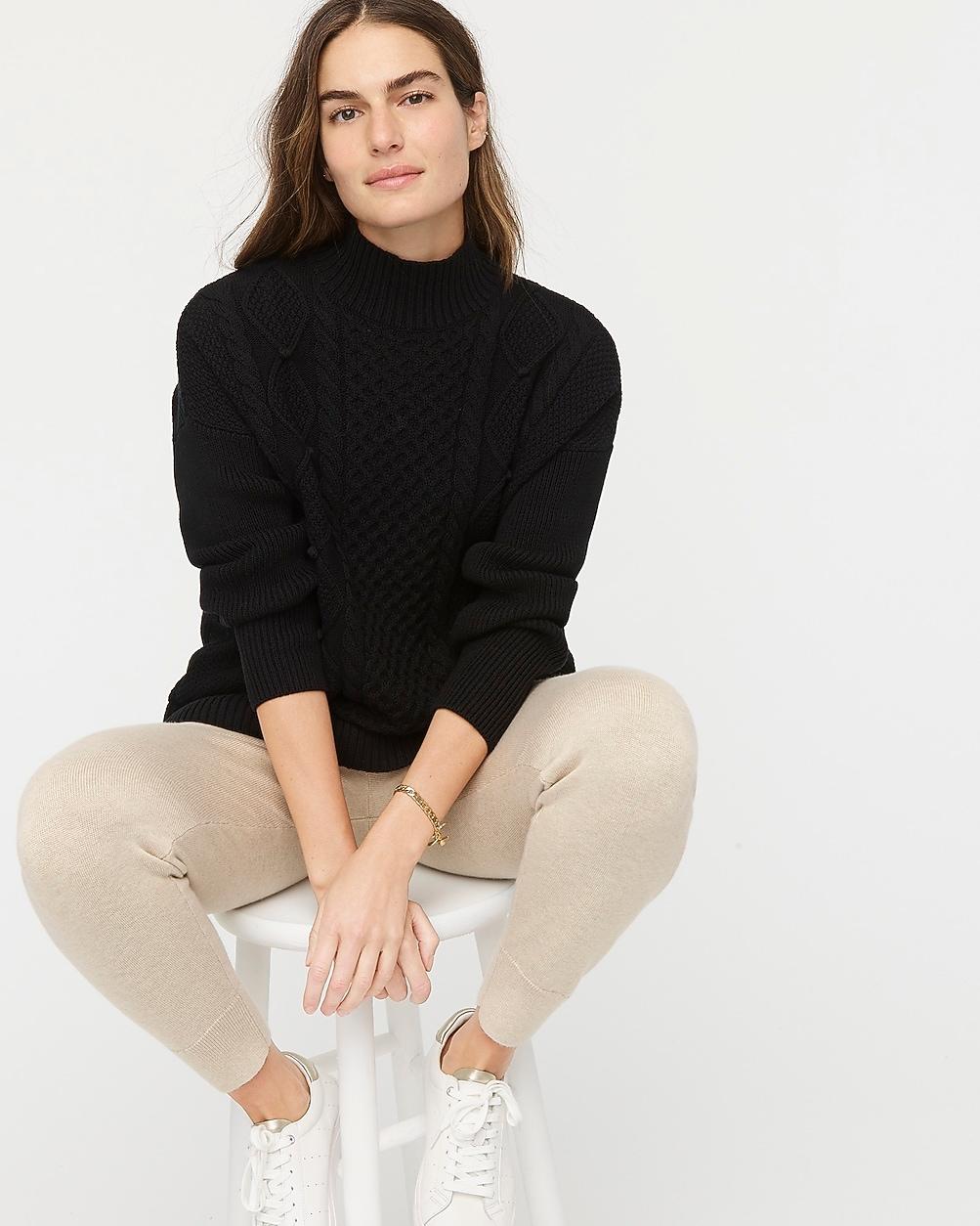 Swingy cable-knit mockneck sweater by J.CREW