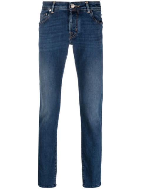 skinny stonewashed jeans by JACOB COHEN