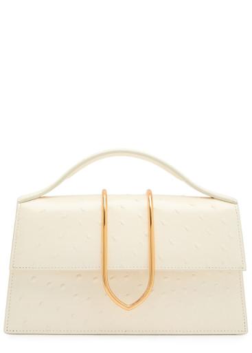 Le Grand Bambino polka dot leather top handle bag by JACQUEMUS