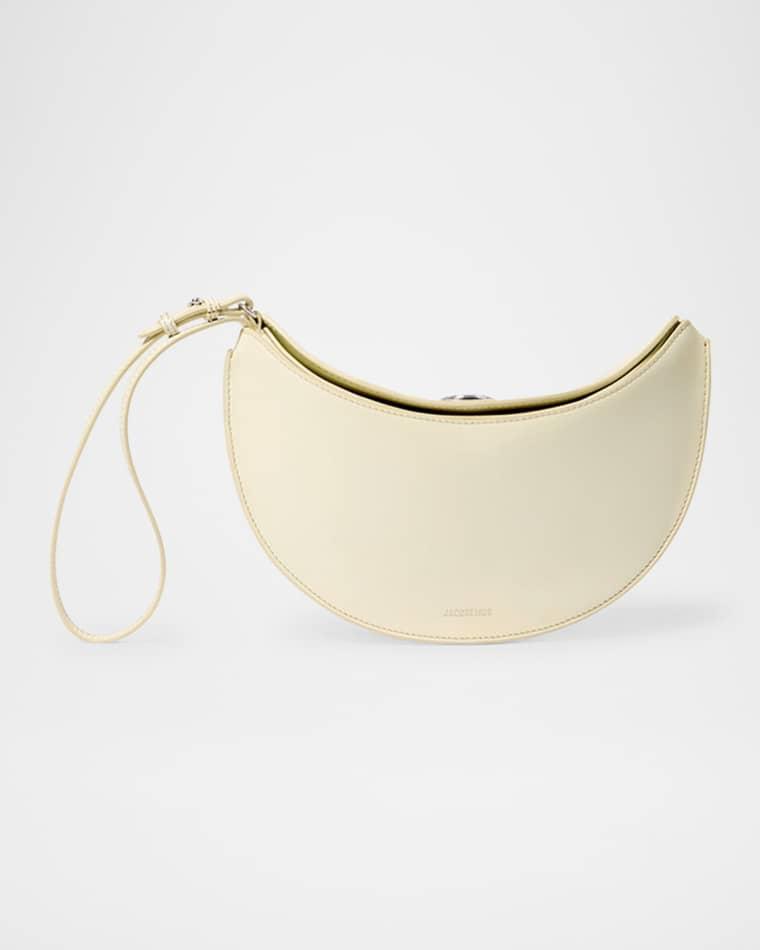 Le Petit Calisson Rond Leather Wristlet by JACQUEMUS