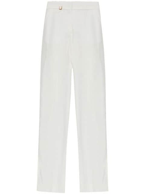 The Tibau charm-detail trousers by JACQUEMUS