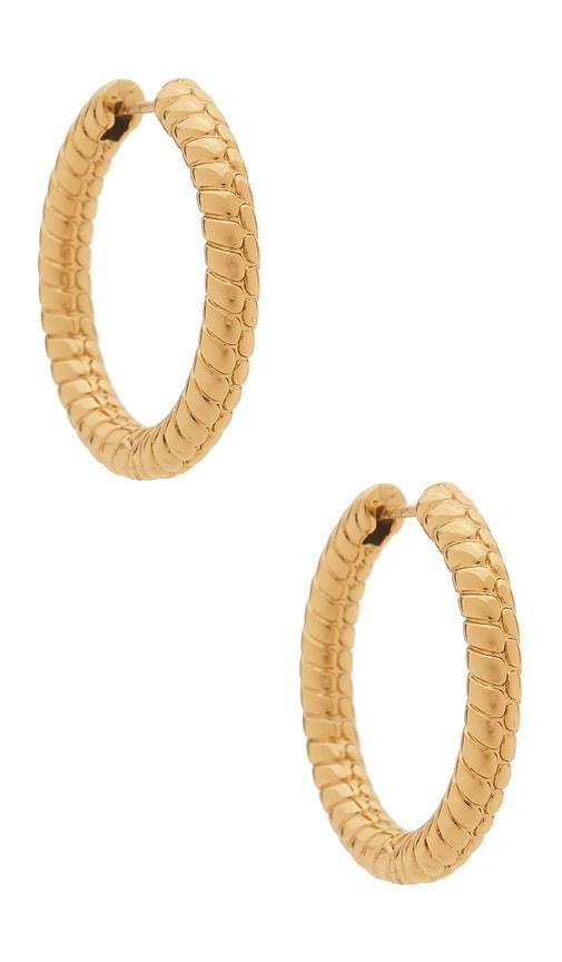 Jennifer Fisher Madison Huggie Earrings in Metallic Gold by JENNIFER FISHER