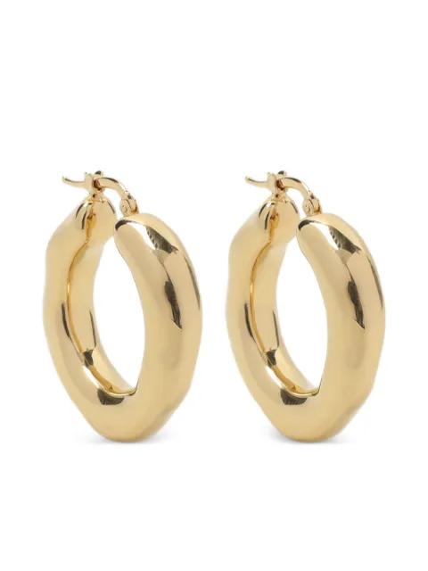 brass hoop earrings by JIL SANDER