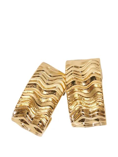 wave-textured hoop earrings by JIL SANDER