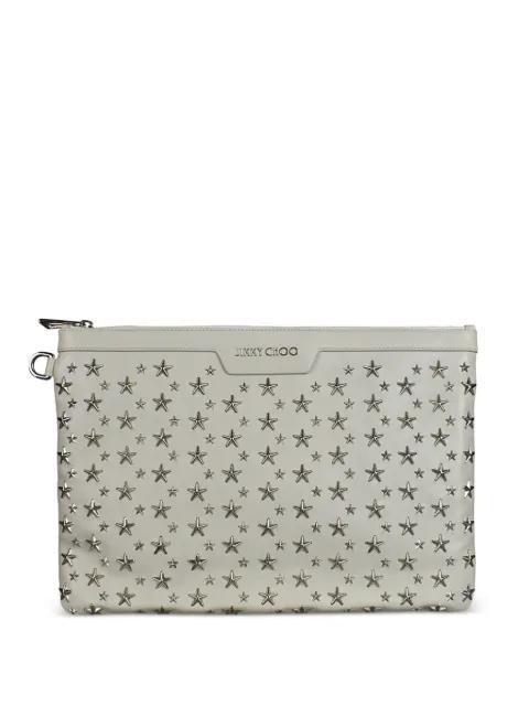 embossed stars leather clutch bag by JIMMY CHOO