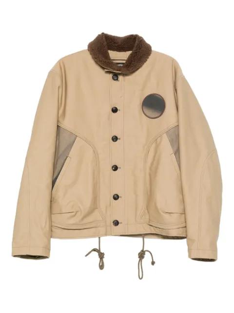 circular-patch button-fastening jacket by JIYONG KIM
