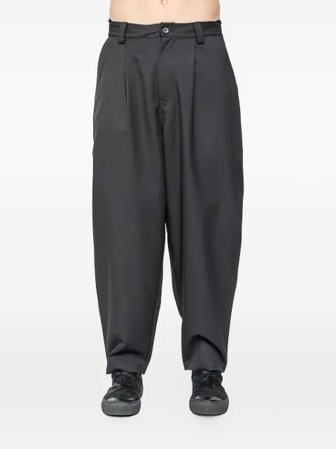 Glide pleated trousers by JOE CHIA