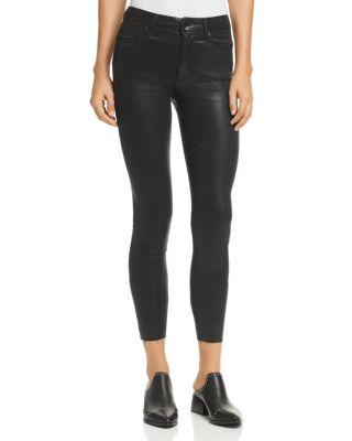 The Charlie High-Rise Coated Ankle Skinny Jeans in Black by JOE'S JEANS