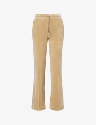 Rhinestone-embellished straight-leg mid-rise velour jogging bottoms by JUICY COUTURE
