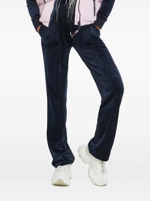 velour pocketed track pants by JUICY COUTURE