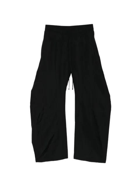 bending wide-leg trousers by JULIUS