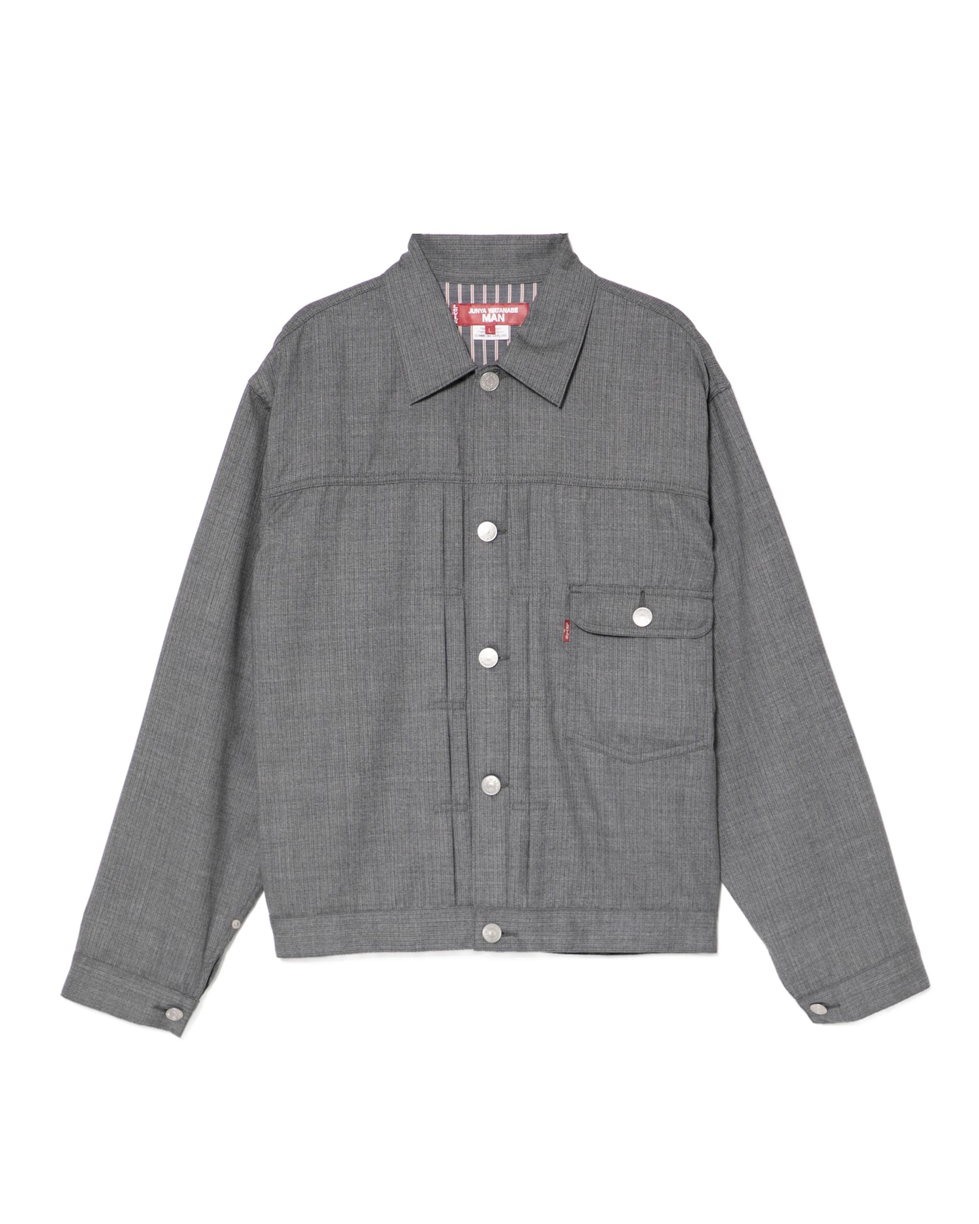 Buttoned jacket by JUNYA WATANABE