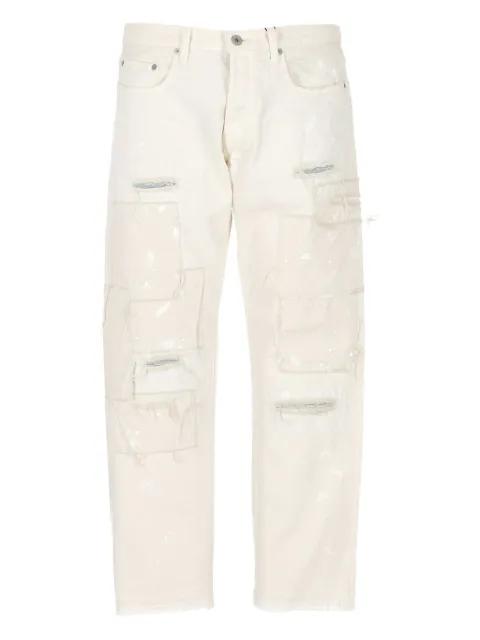 distressed- effect jeans by JUNYA WATANABE
