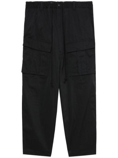 drop-crotch cropped cargo trousers by JUNYA WATANABE