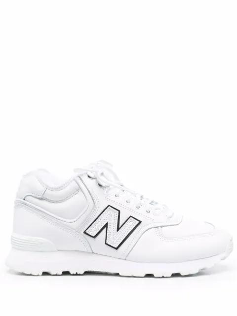 logo-patch low-top leather sneakers by JUNYA WATANABE