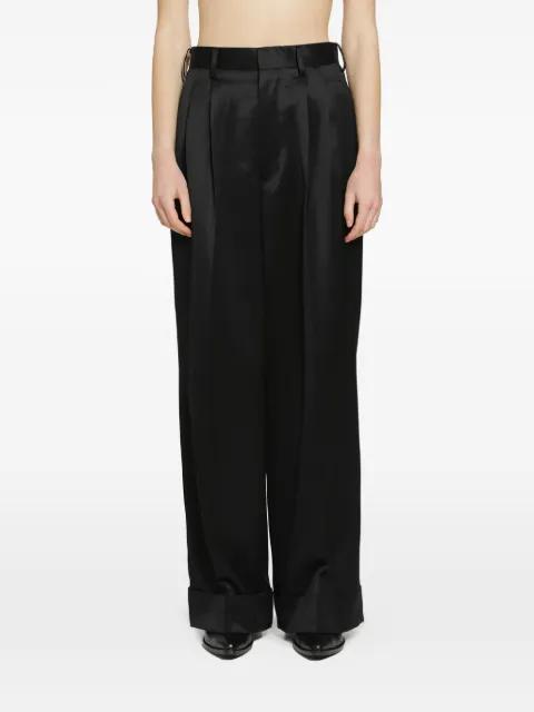 pleated trousers by JUNYA WATANABE