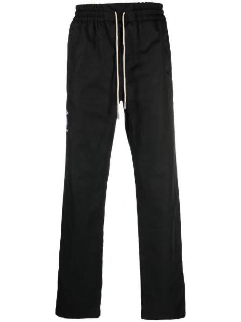 logo-embroidered track pants by JUST DON