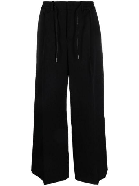 pleated wide-leg trousers by JUUN.J
