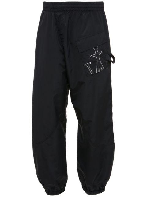 Anchor-embroidered twisted track pants by JW ANDERSON