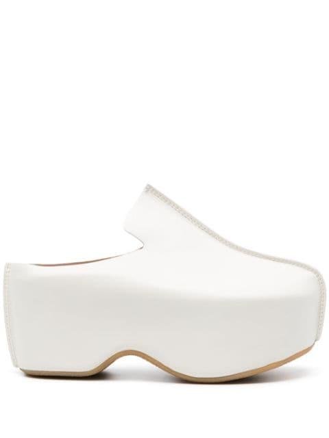 leather platform clogs by JW ANDERSON