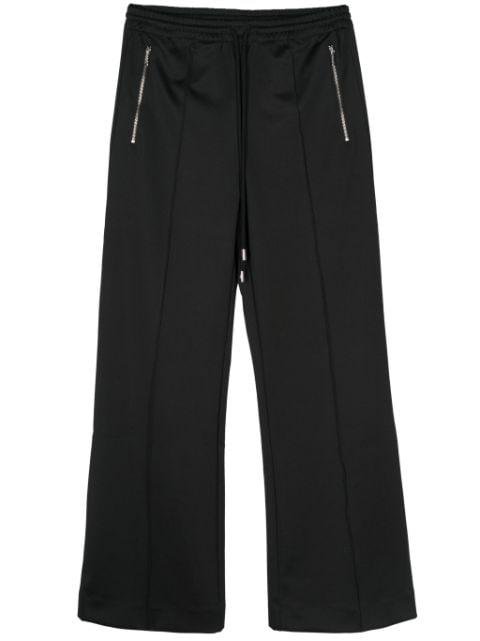 raised seam-detail bootcut track pants by JW ANDERSON