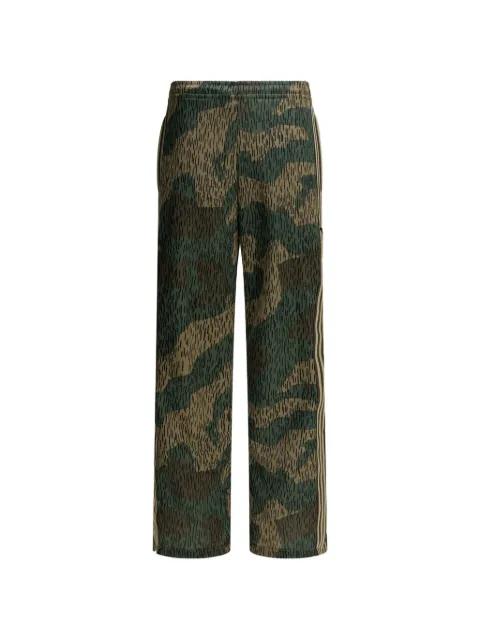 camouflage-pattern trousers by KAPITAL