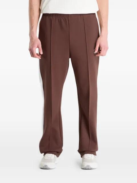 side-stripe logo-embroidered track pants by KARL KANI