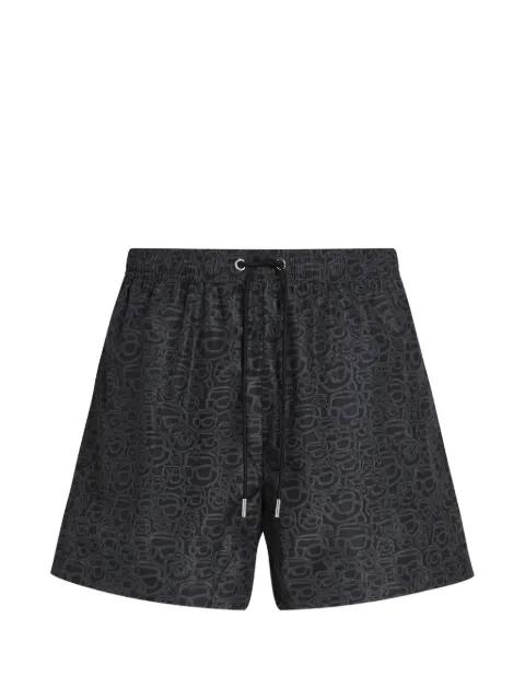 Ikon Sketch Face patterned swim shorts by KARL LAGERFELD