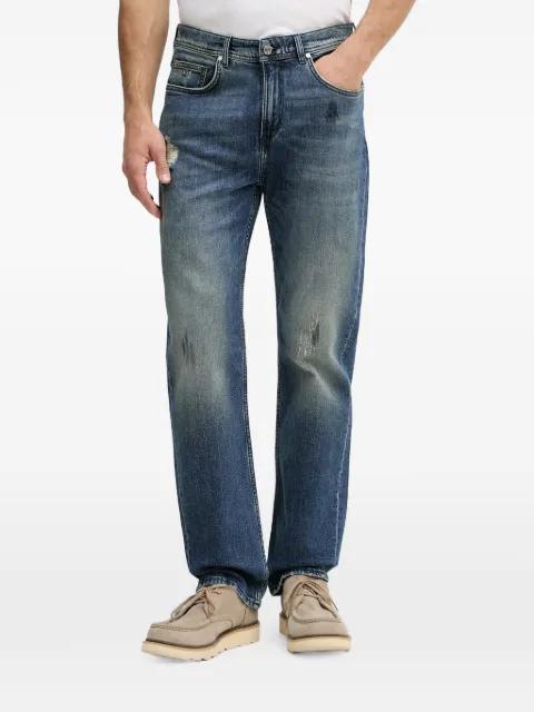 distressed faded jeans by KARL LAGERFELD