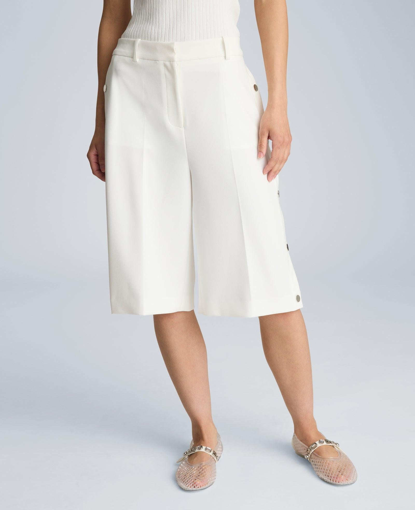 Kenneth Cole | High Rise Fly Front Long Short With Rivet Side Snap by KENNETH COLE