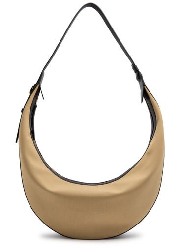 Augustina panelled canvas hobo bag by KHAITE