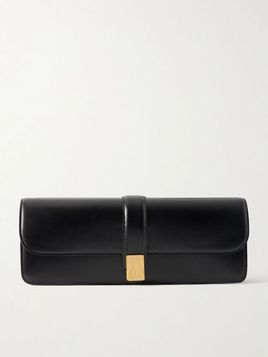 Black leather clutch bag by KHAITE