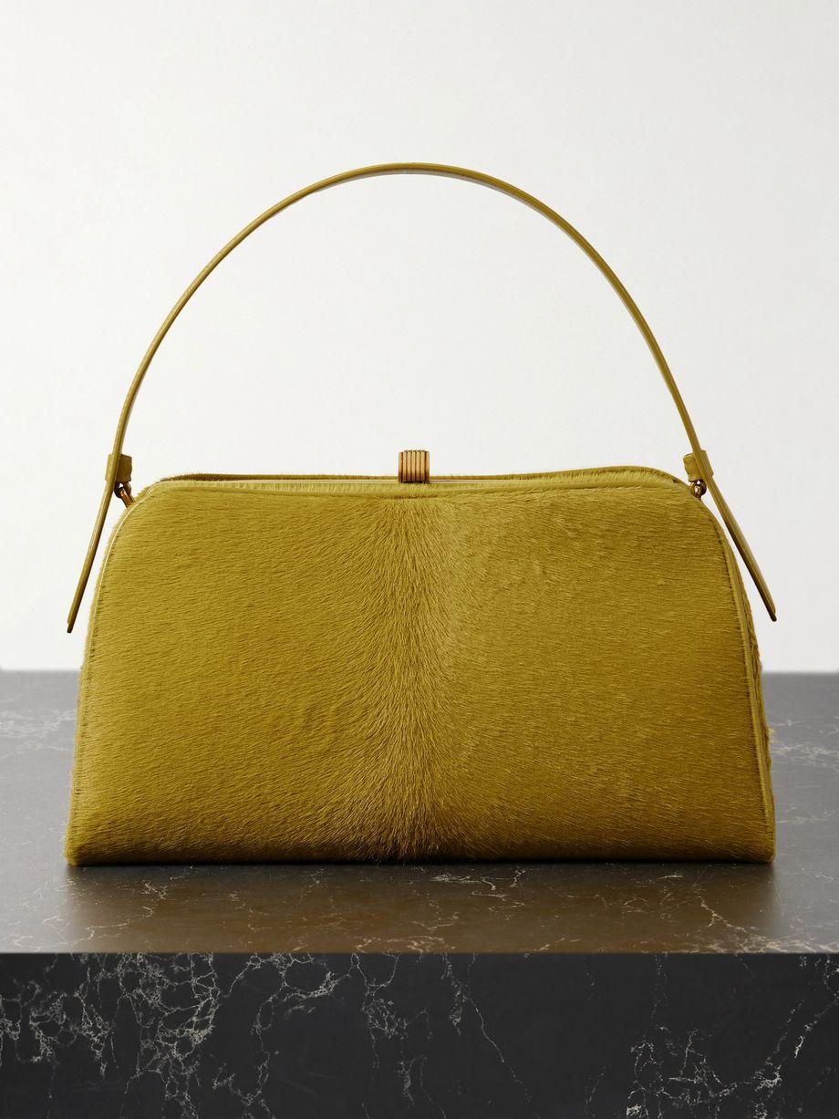 Cate leather-trimmed calf hair tote by KHAITE