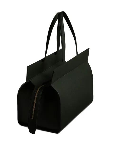Pebbled leather zip handbag by KHAITE