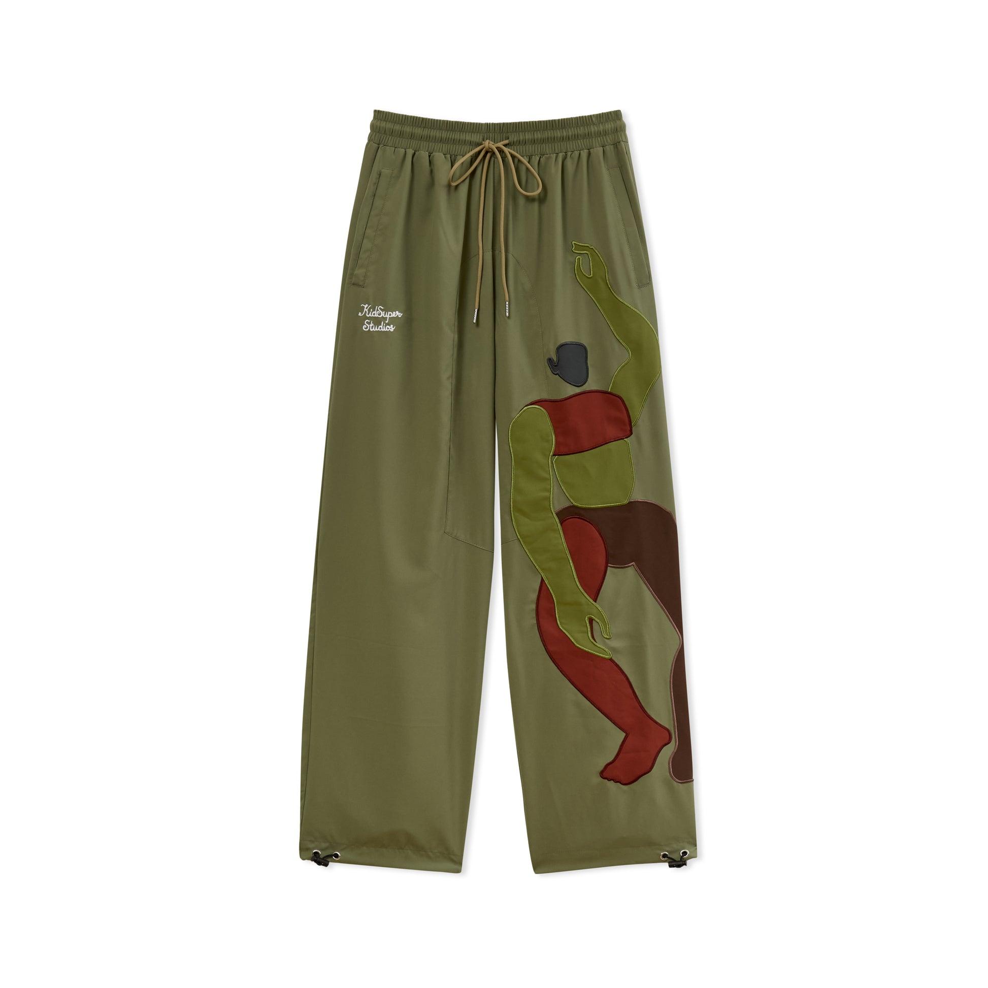 Falling Guy Track Pants [Green] by KIDSUPER STUDIOS