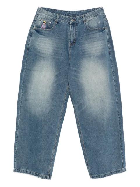 button-fastening jeans by KIDSUPER STUDIOS