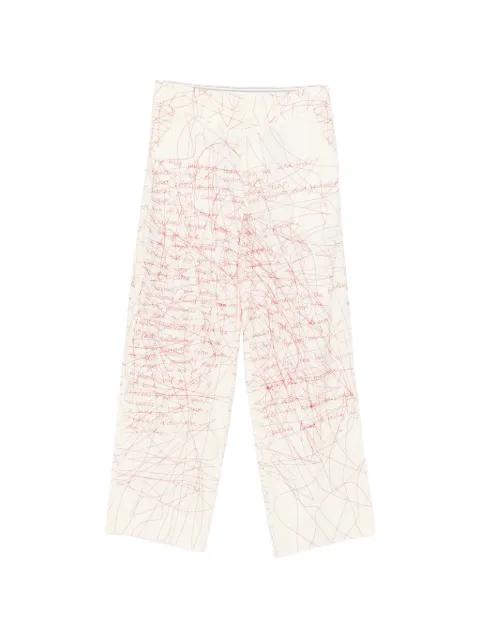 scribbled printed trousers by KIDSUPER STUDIOS