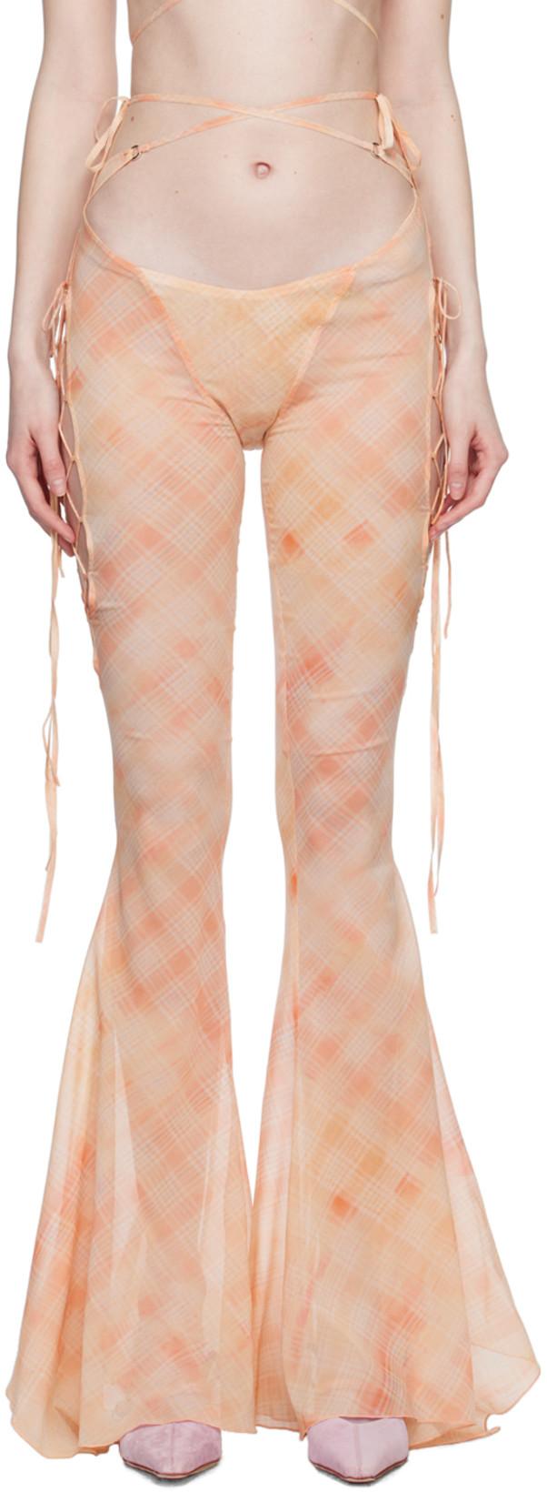 Orange Glimmer Trousers by KNWLS