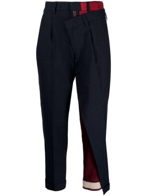 asymmetric tapered trousers by KOLOR