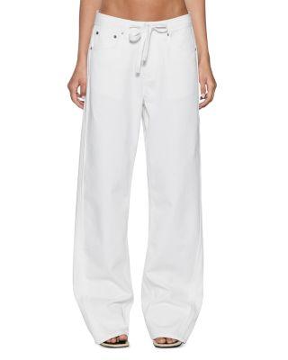 Low Rider Trak Blanc Jeans in White by KSUBI