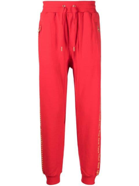slogan-embroidered track pants by KSUBI