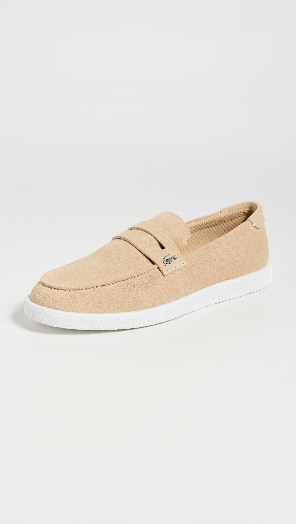 Cochet Suede Slip Ons by LACOSTE