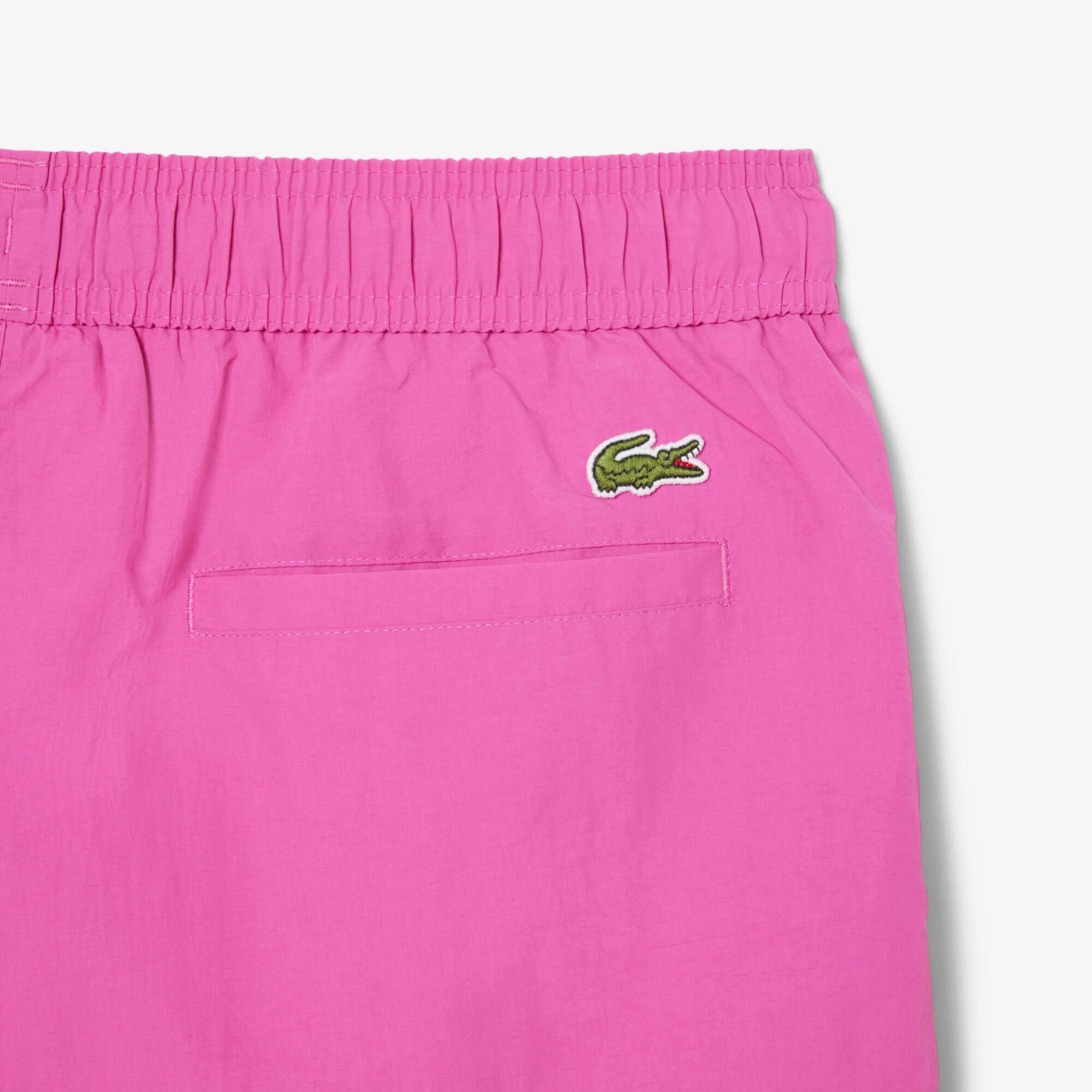 Men's Short Badge Accent Swim Trunks by LACOSTE