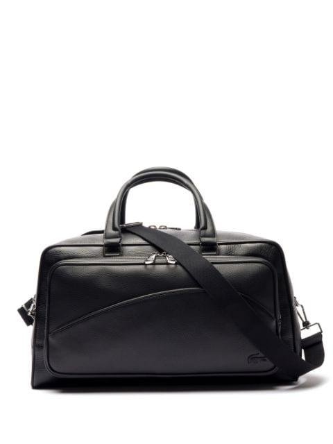 multi-pocket leather holdall by LACOSTE