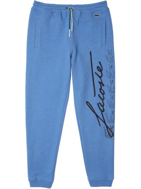 printed "Blue" track pants by LACOSTE