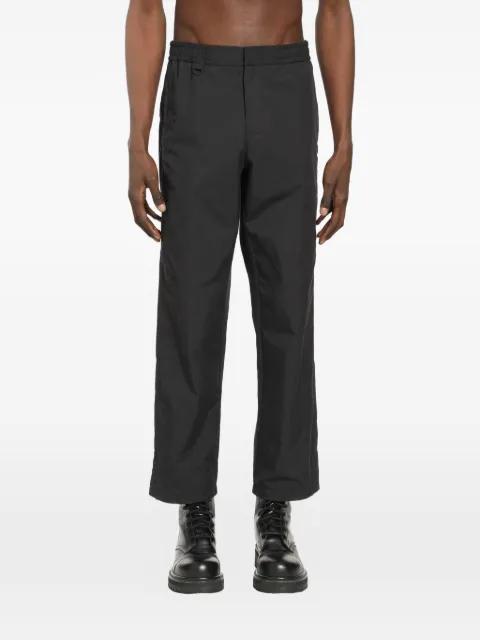 elastic-waistband trousers by LAMINAR