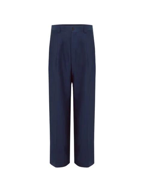 buttoned-flap-pocket trousers by LANEUS
