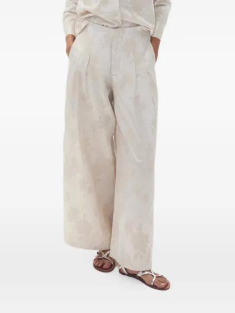floral-print pleated trousers by LANHTROPY